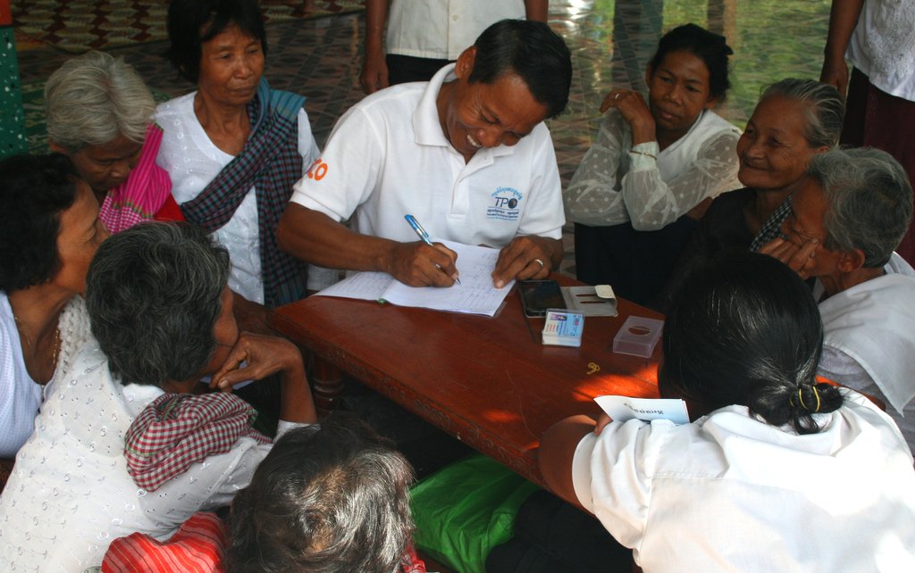 Locals getting to know about TPO at a pagoda.