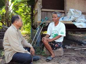 TPO Counselor visiting a client in a rural area