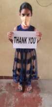 She is thanking  donor for helping her education