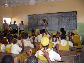 In Abuja, Instructor teaching and students learnin