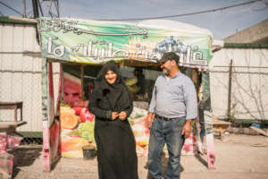 Iman and Ahmed in front of their Falafel stand