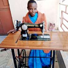 Susan proudly showing her new sewing machine