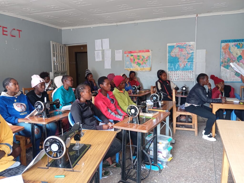 The former student speaking with the students