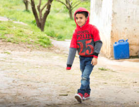 Kareem walks to Concern's learning center