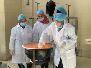 Khadija participating in a dairy training