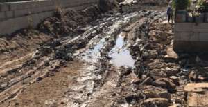A path in the settlement in terrible condition