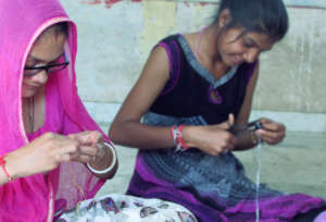 Women trainee learn handicraft skills