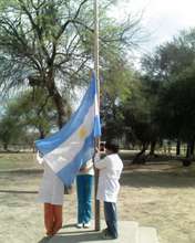 Children raising the National flag