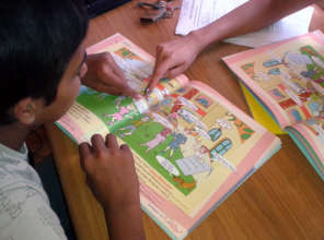 Hassan learns English and Serbian while waiting...