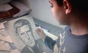 Fahrid with his drawings