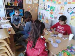 Working together to bring smiles in a refugee camp