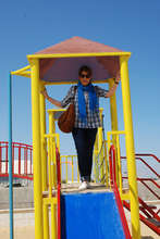Board Member, Souzan Jaber, trying out the slide!