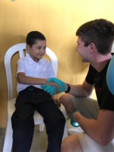 Students assist with screening