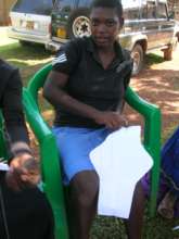 Agirl sewing using a safety pin