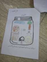 A filled gratitude jar featuring a mango
