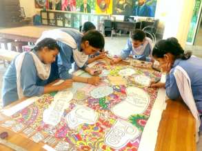 Students working on a banner for the CLF