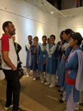 Imran Qureshi gives students a talk about his art