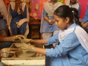 Practicing Pottery making