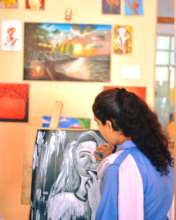 Painting a portrait during class