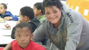 Rita with the children during lunchtime