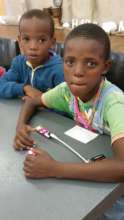 Anathi and a friend working with LittleBits