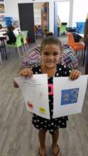 Andrey with her drawing from Elbi
