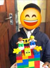 School child creates a cake from a book he read
