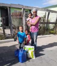 A family in Manenberg receiving food