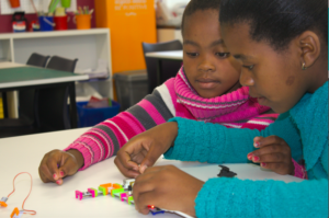 Thandi* and Bongi* working with LittleBits