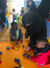 ORT SA CAPE's director, Lydia, with the children
