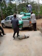 loading moringa seeds to be taken for oil pressing