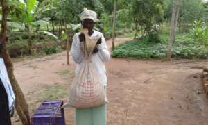 DNRC farmer bringing moringa seeds to DNRC