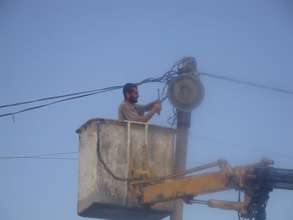 Light Being Installed on walkway to field (2009)