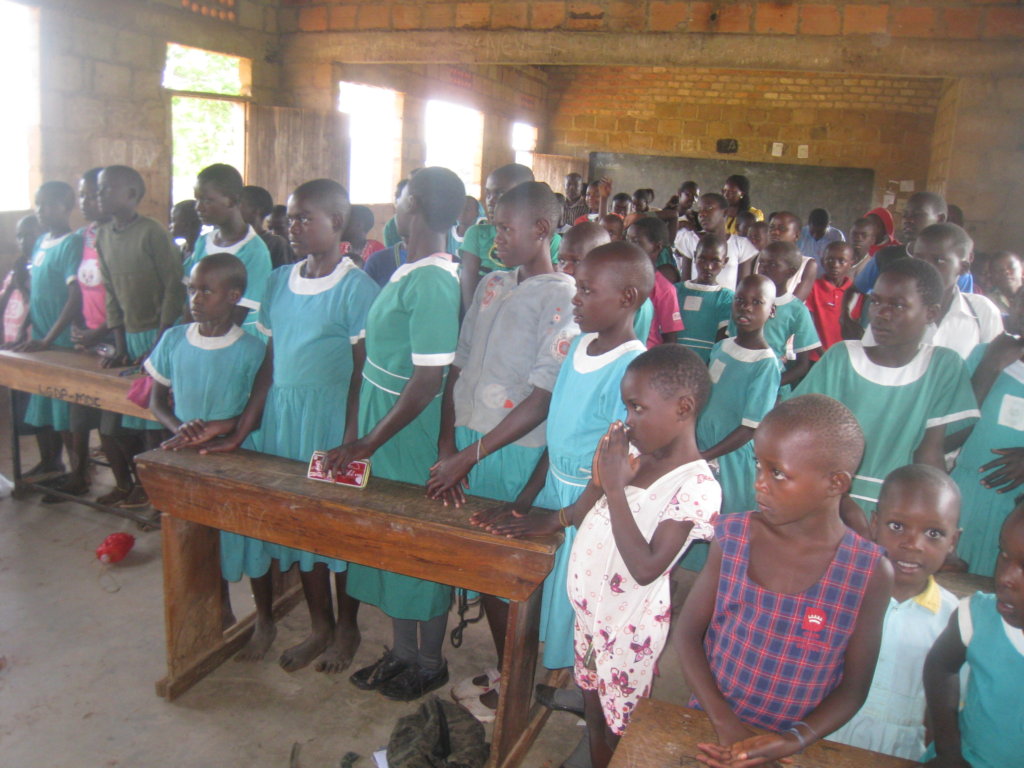 Provide school uniforms to 100 pupils in Uganda