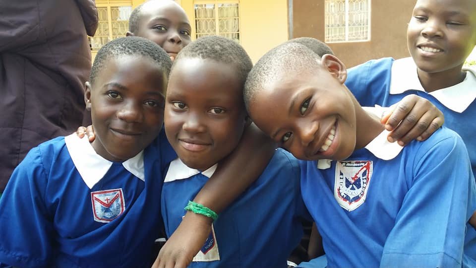 Provide school uniforms to 100 pupils in Uganda