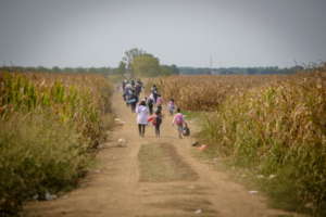 Refugees hurry to cross the border
