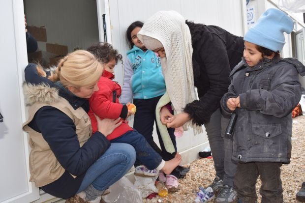 Providing winter clothing to refugees in Serbia