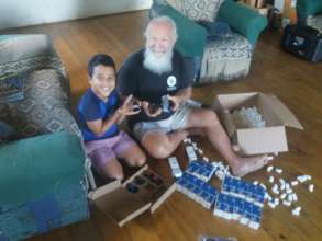 Austin and Grandson Kiki Unpacking the Loggers!