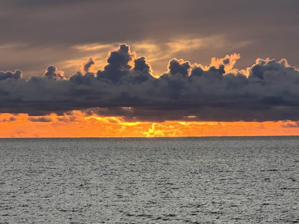 Fiji sunset Nadi on fire over calm Coral Sea