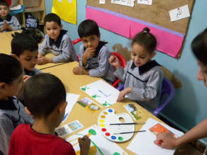 Young children in Lebanon doing arts and crafts