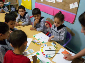 Young children in Lebanon doing arts and crafts