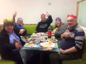Community Members enjoying Christmas Dinner