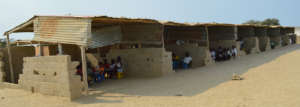 Makeshift classrooms of corrugated tin