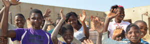 Kids at construction site of a RISE school