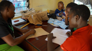 Beneficiaries learning garment designing