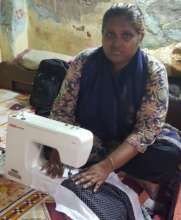 Halima with her sewing machine