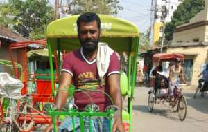Ujala's Father with his new rickshaw