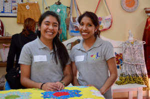 Laura and Juana with quilt