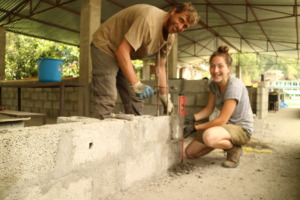 Phillip and Fran lay the foundations