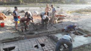 The septic tank's concrete lid is poured
